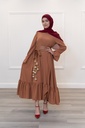 A wide brick-colored dress