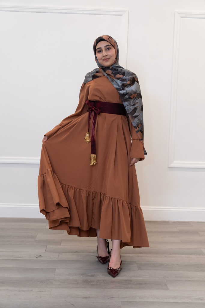 A wide brick-colored dress