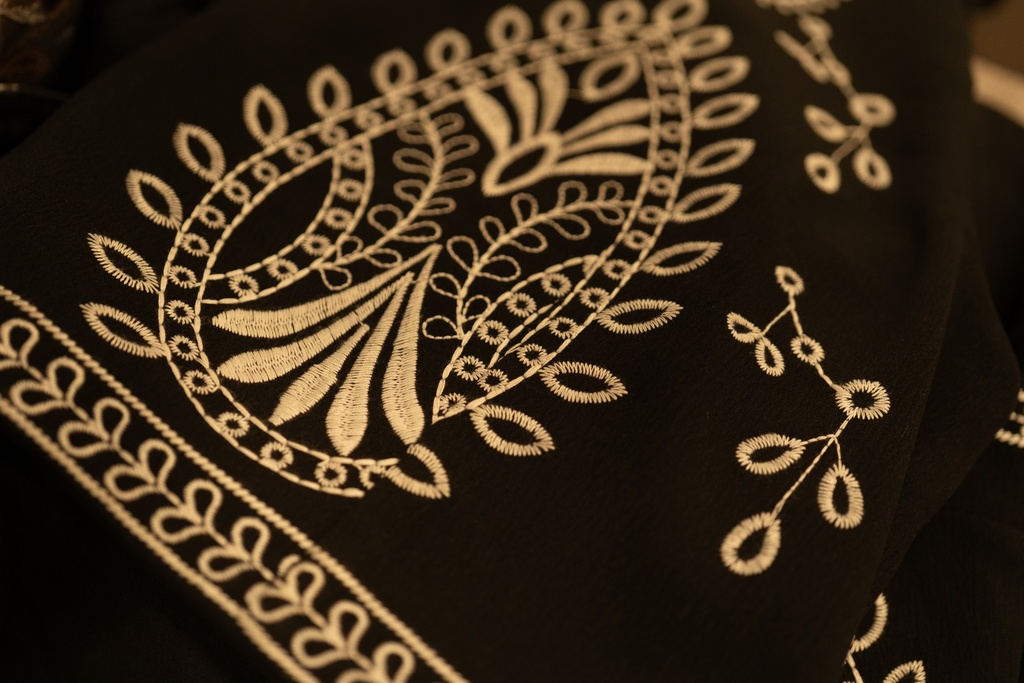 A black Vest Embroidered in White 