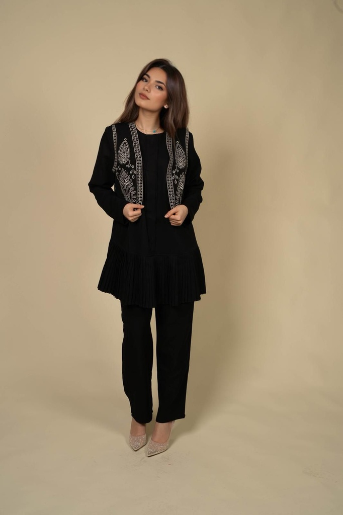 A black Vest Embroidered in White 
